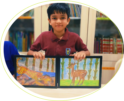 A boy holding the paint at anand niketan school