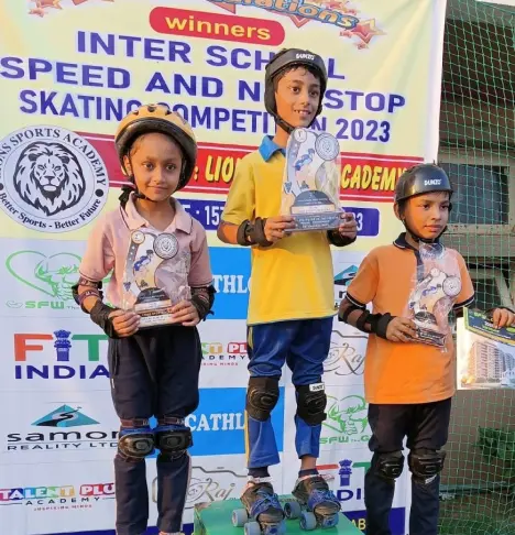 Prize ceremony for skating winner - primary students at anand niketan school